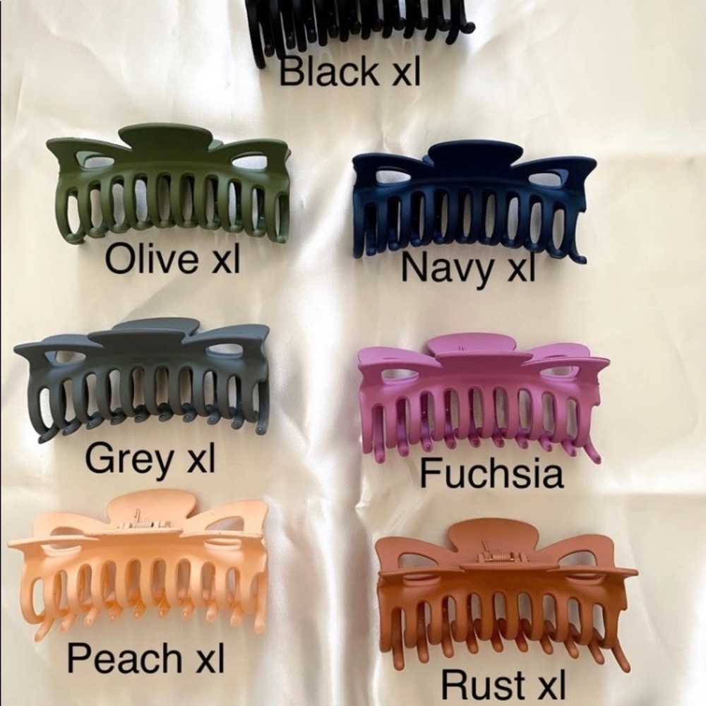 Colored claw clips…are very sturdy and will keep your hair up all day!